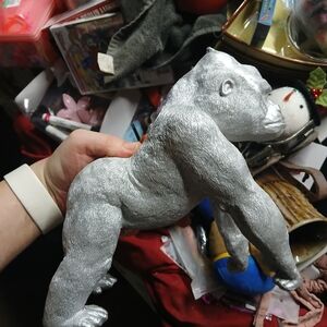 Sagebrook Home silver polyresin gorilla figurine or a similar decorative statue.